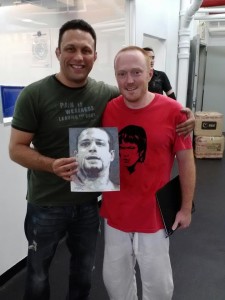 International BJJ legend Renzo Gracie holding the portrait I drew of his late brother Ryan during one of my trips to NY to train at his academy
